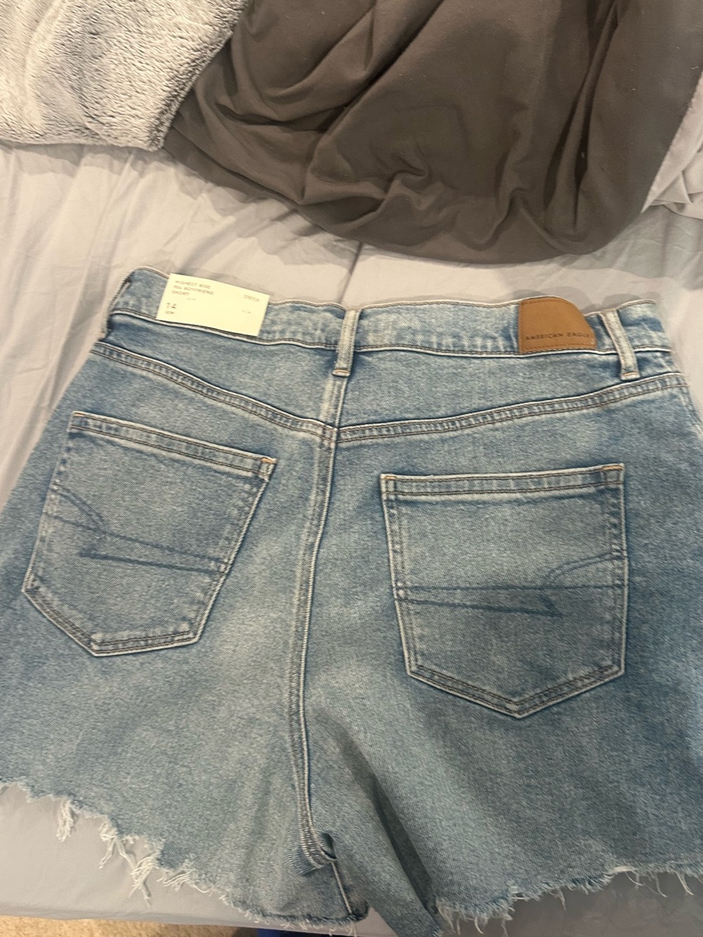 American Eagle Outfitters Faded Light Blue High-Waist Denim Cutoff Shorts - Picture 2 of 2